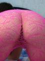 Naughty babe in pink hose plays with a rubber cock