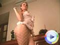 Cutie in see-through peignoir and fishnet nylons